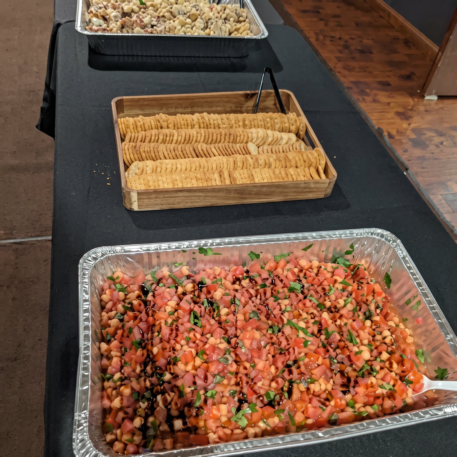 Bruschetta, pasta and sides on a catered buffet table